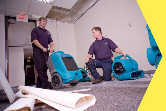 Commercial dehumidifier running in a basement to prevent mold growth
